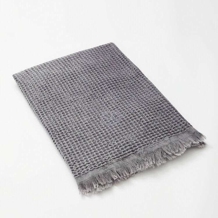 Lanza Dark Grey Pestemal | Moeva | Towel | Each week unveils new pieces—luxury swimwear, fluid resort silhouettes, and elevated summer-to-evening essentials designed to carry you from coastal escapes to city nights.