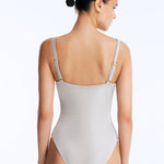 Model in Lennox Silver Underwire Swimsuit - Back View: Full Bottom Coverage, Italian Fabric, MOEVA Luxury Swimwear