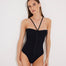 Front View: Model in Lia Black Swimsuit - MOEVA Luxury Swimwear, Corset Silhouette, Figure Sculpting, Stitching Details, Underwired Cups, Centrally Placed Adjustable Straps, MOEVA Luxury Swimwear 