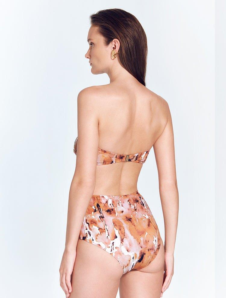 "Back view of Livia Floral Abstract Bikini Bottom: High-waisted floral abstract bikini bottom showing moderate coverage and fully lined back."