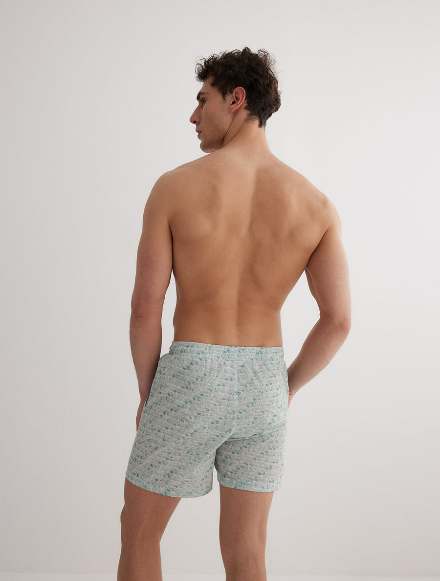 Back View: Model in Louis Green Abstract Shorts - MOEVA Luxury Swimwear, Men Swim Shorts, Nikel, Mid Length Swim Shorts, Fully Lined, Slim Fit, Quick Dry, MOEVA Luxury Swimwear