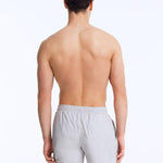 Back View: Louis Light Grey Shorts on Model - MOEVA Luxury Swimwear, Drawstring Waist, Mid Length, Quick Dry, MOEVA Luxury Swimwear   