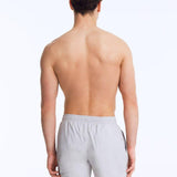 Back View: Louis Light Grey Shorts on Model - MOEVA Luxury Swimwear, Drawstring Waist, Mid Length, Quick Dry, MOEVA Luxury Swimwear   