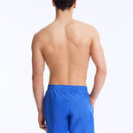 Back View: Louis Sax Blue Shorts on Model - Drawstring Waist, Mid Length, Quick Dry, MOEVA Luxury Swimwear   