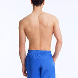 Back View: Louis Sax Blue Shorts on Model - Drawstring Waist, Mid Length, Quick Dry, MOEVA Luxury Swimwear   
