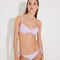 Front View: Model in Luigiana Lilac Bikini Top - Adjustable Straps, Lined, Italian Fabric, Special Lycra, Xtralife Certificate MOEVA Luxury Swimwear 