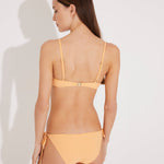 Back View: Model in Luigiana Orange Bikini Bottom - MOEVA Luxury Swimwear, Fully Lined, Italian Fabric, Special Lycra Xtralife Certificate, Side Tie Low-Waist Black Bikini Bottom,  MOEVA Luxury Swimwear  