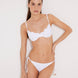 Front View: Model in Luigiana White Bikini Bottom - MOEVA Luxury Swimwear, Low Waist, Side-Tie, Gold Stopper, Stitching Details, Moderate Bottom Coverage, MOEVA Luxury Swimwear  