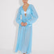 "Front view of a model wearing the Lula Blue Maxi Dress, showcasing its classic silhouette and blouson sleeves."