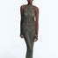 "Model wearing Luna Army Green Crochet Dress from the front, highlighting the floor-length design and scoop neckline."