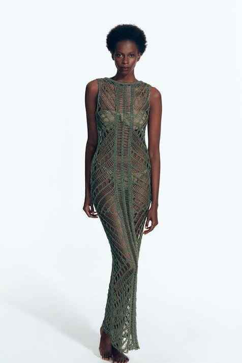 "Model wearing Luna Army Green Crochet Dress from the front, highlighting the floor-length design and scoop neckline."