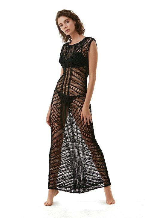 "Model wearing Luna Black Crochet Dress from the front, highlighting the floor-length design and scoop neckline."