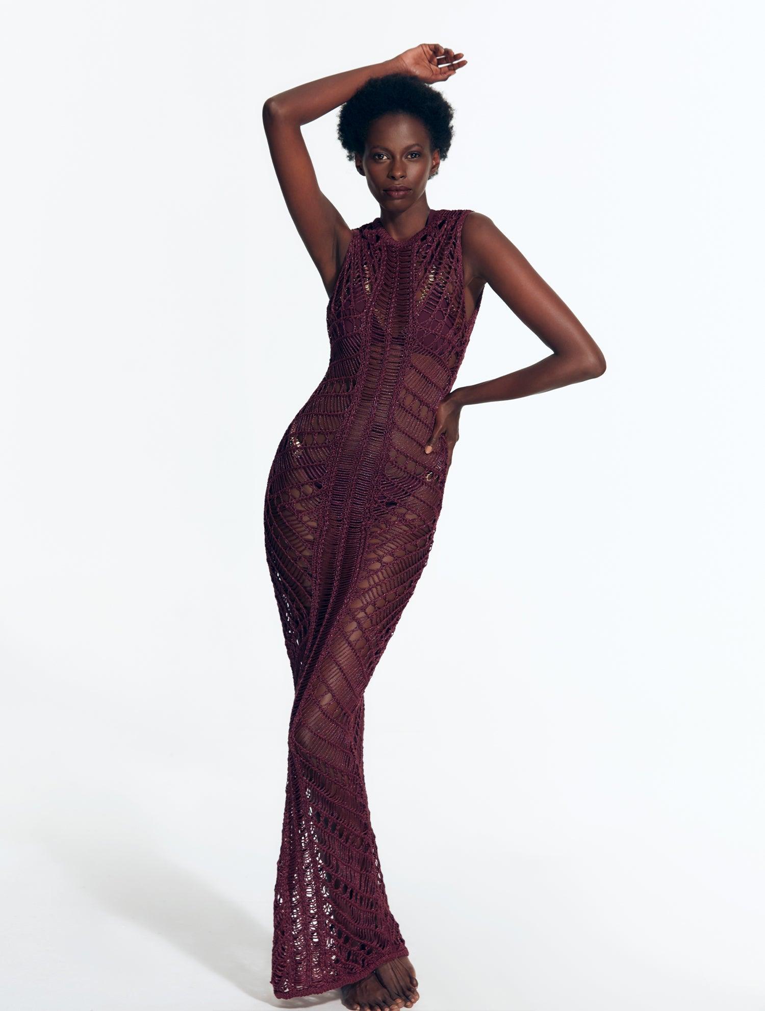 "Model wearing Luna Prune Crochet Dress from the front, highlighting the floor-length design and scoop neckline."