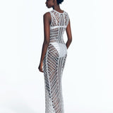 "Back view of Luna Silver Dress displaying intricate crochet pattern."