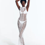 "Model wearing Luna White Crochet Dress  Rwith from front view floor-length design and scoop neckline."