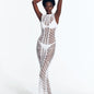 "Model wearing Luna White Crochet Dress  Rwith from front view floor-length design and scoop neckline."