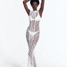 "Model wearing Luna White Crochet Dress  Rwith from front view floor-length design and scoop neckline."