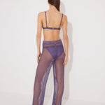 Back View: Model in Luz Lilac Pants - MOEVA Luxury Swimwear, Low Rise, Ankle Length,Comfort and Chic Beachwear, MOEVA Luxury Swimwear