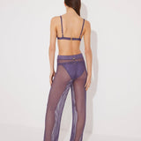Back View: Model in Luz Lilac Pants - MOEVA Luxury Swimwear, Low Rise, Ankle Length,Comfort and Chic Beachwear, MOEVA Luxury Swimwear