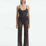 Front View: Model in Luz Silver Pants - MOEVA Luxury Swimwear, Mesh Knit, Ribbed, Metallic, MOEVA Luxury Swimwear