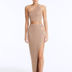 Front View: Model in Lyndon Bronze Skirt - High Waist, %100 Viscose, Ankle Length, Cut Out Detail, MOEVA Luxury Swimwear