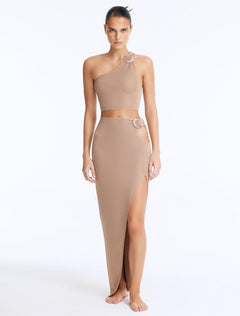 Front View: Model in Lyndon Bronze Skirt - High Waist, %100 Viscose, Ankle Length, Cut Out Detail, MOEVA Luxury Swimwear