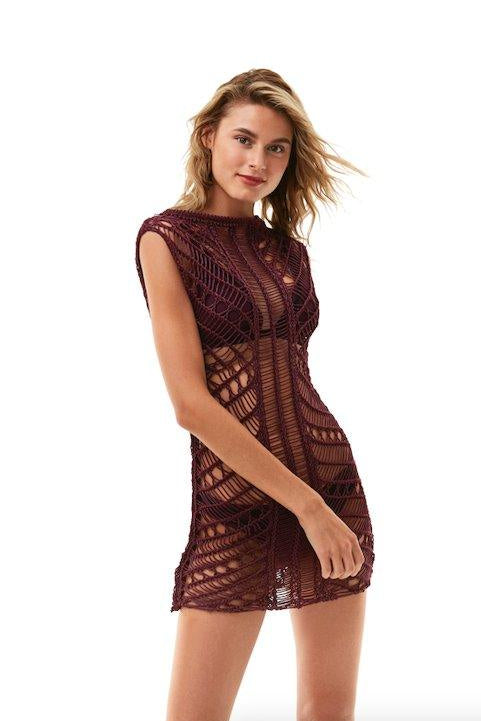 "Front view of Maggie Prune Dress on a model, showcasing the luxurious handmade crochet fabric and scoop neckline."
