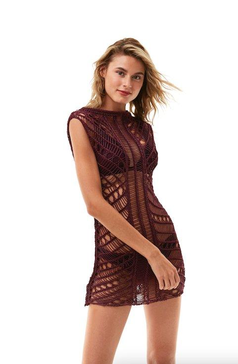 "Front view of Maggie Prune Dress on a model, showcasing the luxurious handmade crochet fabric and scoop neckline."
