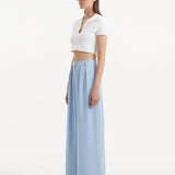 "Side view of the Manami Baby Blue Pants, illustrating the wide-legged cut and the elegant flow of the fabric."