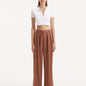 "anami Brown Pants from the front, featuring a high-waisted silhouette and wide-leg cut. "