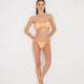 Front View: Model in Marcella Orange Bikini Bottom - MOEVA Luxury Swimwear, Brazilian Bottom, Low Rise, Straps Ties at the Side, Small/Minimum Coverage, MOEVA Luxury Swimwear  