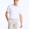 Front View of Model Wearing Marco Semigrey Shorts - MOEVA Luxury Swimwear, Straight-Leg Cut, Pleats at Front, Slip Pockets, MOEVA Luxury Swimwear