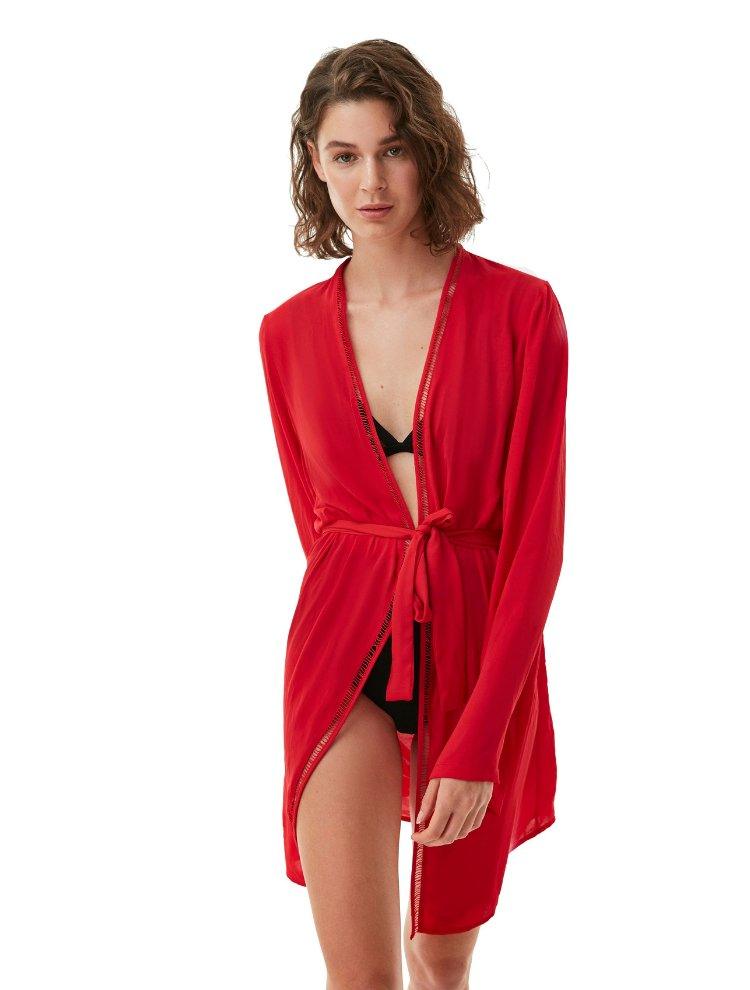 "Front view of the Margot Red Kaftan showing intricate embroidery along the front and a removable strappy belt."