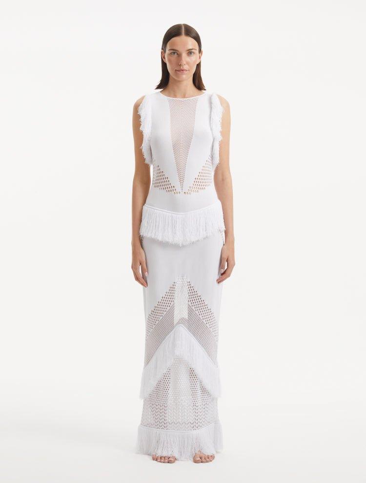 Maris White Dress from the front, highlighting the delicate mesh knit fabric, high neckline, and ankle-length silhouette. "