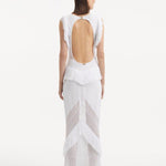 "Maris White Dress from the back, focusing on the low back cut adorned with sparkling gold clasps. "