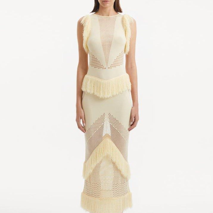 SIOBHAN PERRY-Maris Yellow Knitted Maxi Dress with Fringe and Open Back | Moeva | Set | Each week unveils new pieces—luxury swimwear, fluid resort silhouettes, and elevated summer-to-evening essentials designed to carry you from coastal escapes to city nights.