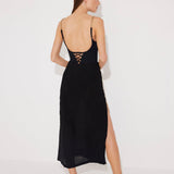Back View: Model in Maritza Black Skirt - MOEVA Luxury Swimwear, Maxi Skirt, Unlined,Chic, Accessorised, Soft Touch Fabric, High Rise Ankle Length Beachwear, MOEVA Luxury Swimwear