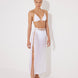 Front View: Model in Maritza White Skirt - MOEVA Luxury Swimwear, Side Slit, High Rise, Elastic Waistband, Geometrical Chain Belt, MOEVA Luxury Swimwear