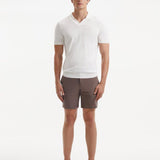 "Front view of Mark white t-shirt featuring slim fit and open collar design".