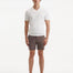 "Front view of Mark white t-shirt featuring slim fit and open collar design".