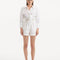 Front view of the Hanson White Shirt and Masha Short , showcasing its pristine white color, long sleeves, and tailored slim fit that elegantly flatters the silhouette.