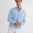 Front View: Model in Matteo Baby Blue Shirt - MOEVA Luxury Swimwear, Spread Collar, Buttoned Cuffs, Half-Plaket, Button Fastening, Tailored Italian Linen, Long-Sleeved, Regular Fit, MOEVA Luxury Swimwear