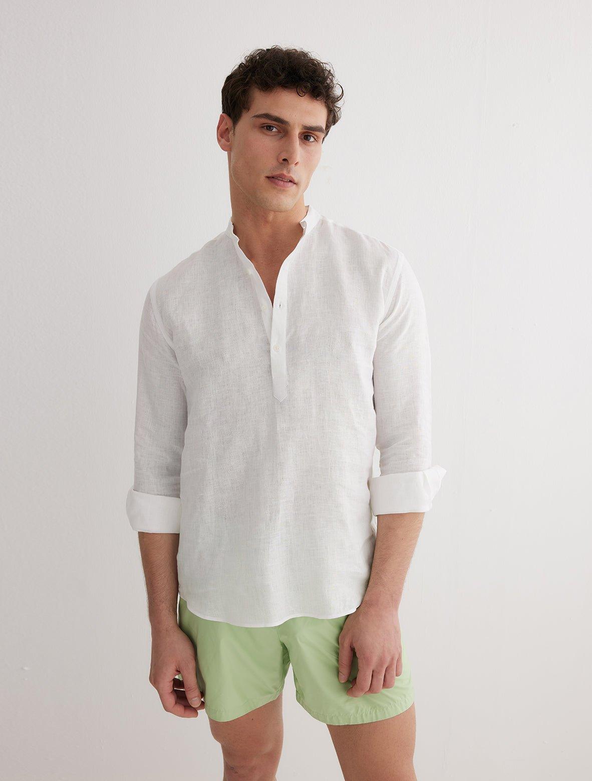 Front View: Model in Matteo White Shirt - MOEVA Luxury Swimwear, Spread Collar, Buttoned Cuffs, Half-Plaket, Button Fastening, Tailored Italian Linen, Long-Sleeved, Slim Fit, MOEVA Luxury Swimwear