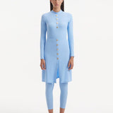 Model wearing the Meissa Baby Blue Burkini, highlighting the soft pastel color and full coverage design.
