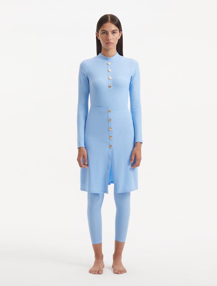 Model wearing the Meissa Baby Blue Burkini, highlighting the soft pastel color and full coverage design.