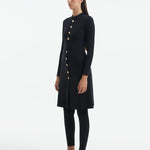 Side view of the Meissa Black Burkini, emphasizing its sleek silhouette and modern style.