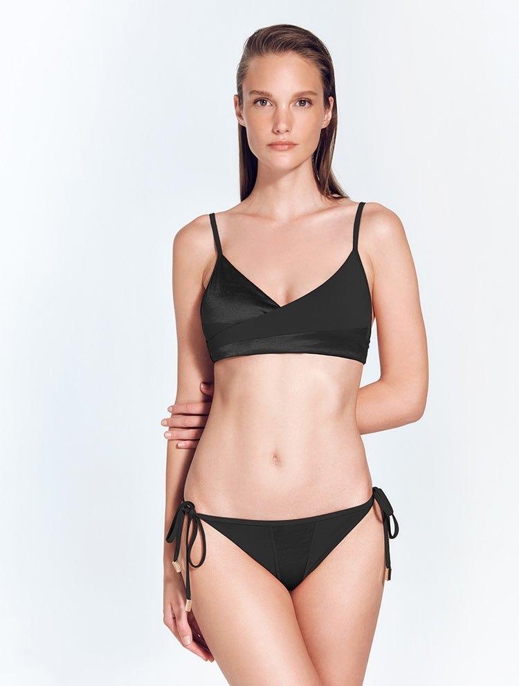 "Front view of the Melody Black Bikini Top showcasing its wrap-effect front and V neckline."