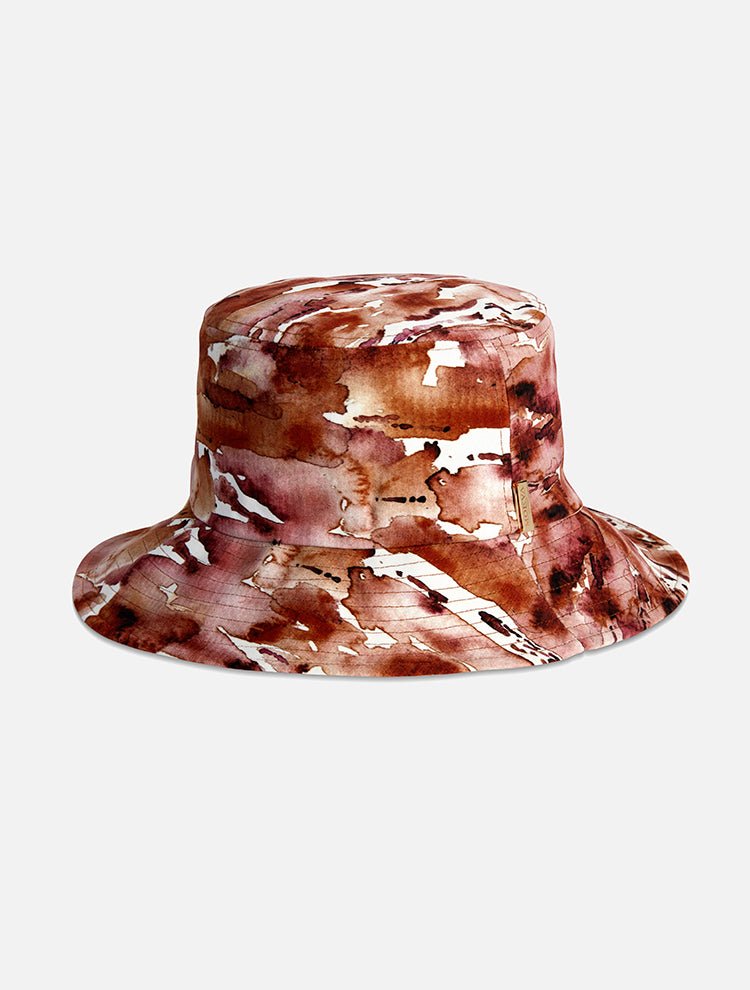 Front View: Miami Floral Abstract Bucket Hat  - MOEVA Luxury Swimwear, Gold, Straw, Swimwear Fabric Bucket Hat, Signature Moeva Patch at Front, Classic Sillhouette, Quilted Brim, Quick Dry, Lined, 72% Polyamide 28% Elastane, MOEVA Luxury Swimwear 