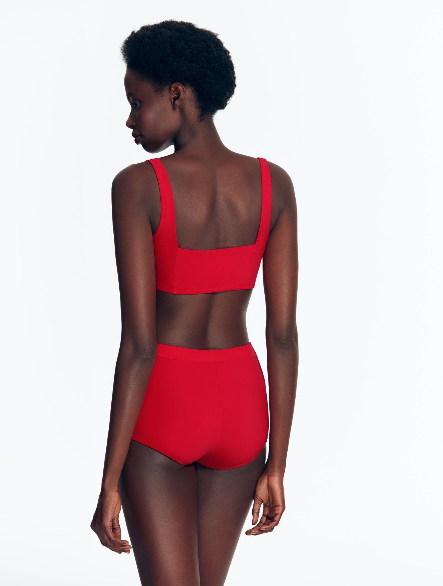 "Model wearing the Michaela Red Bikini Top from the back, highlighting the elegant design and secure fit."