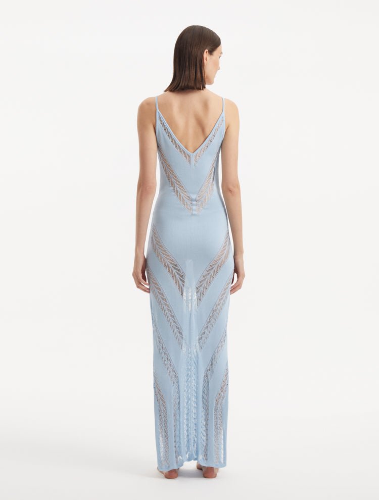 Back View: Model in Mimi Baby Blue Dress  - MOEVA Luxury Swimwear, Knitted Maxi Dress, Comfortable Fit, Unlined, Day to Night and Signature, Slit Details, Close Fit, MOEVA Luxury Swimwear